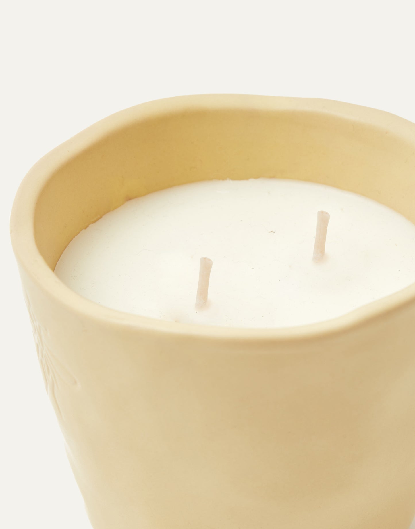 Citronella candle in ceramic pot
