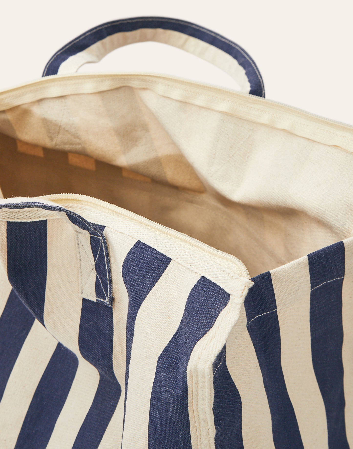 Striped bag with pockets