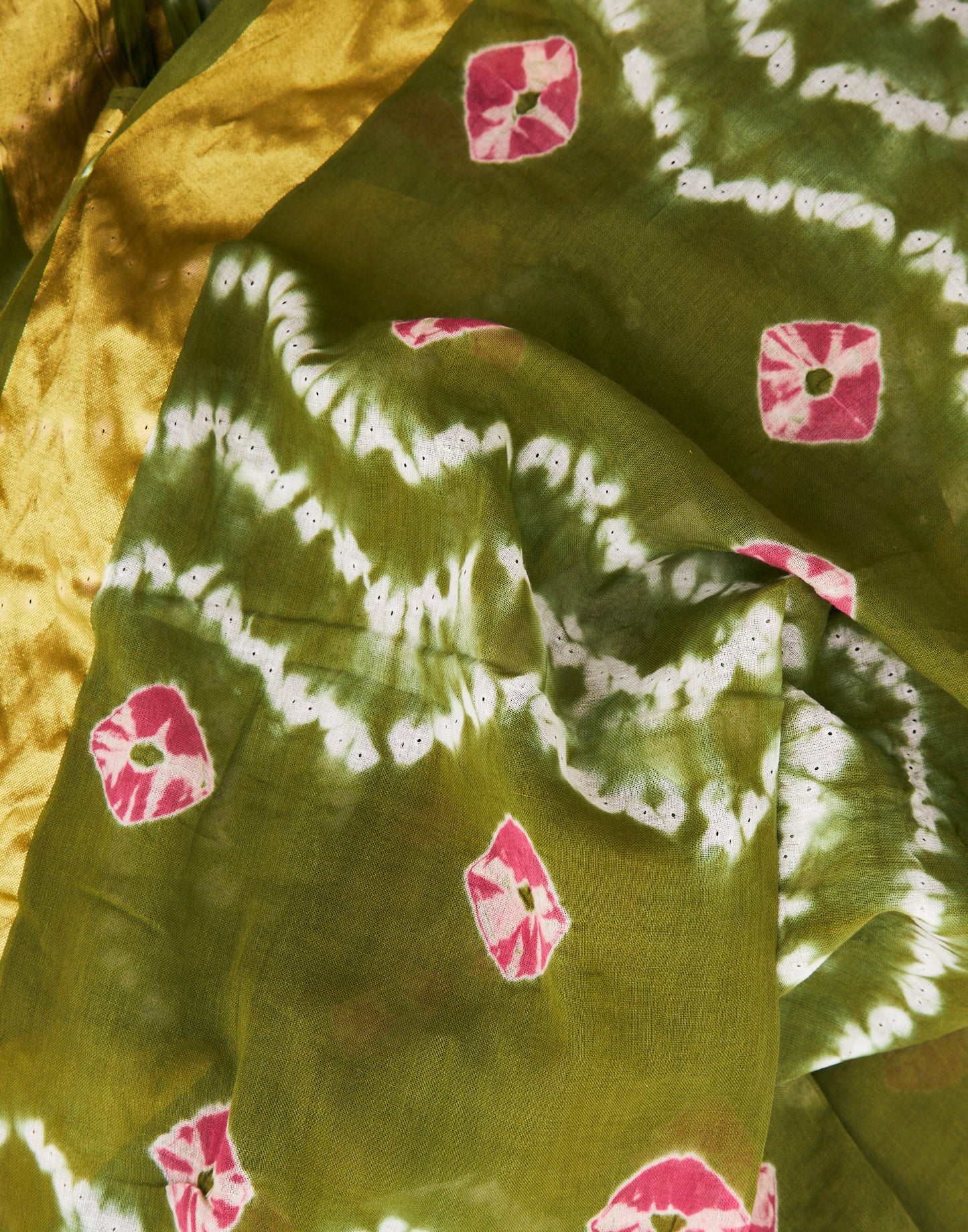 Ikat tie-dye pareo with gold piping