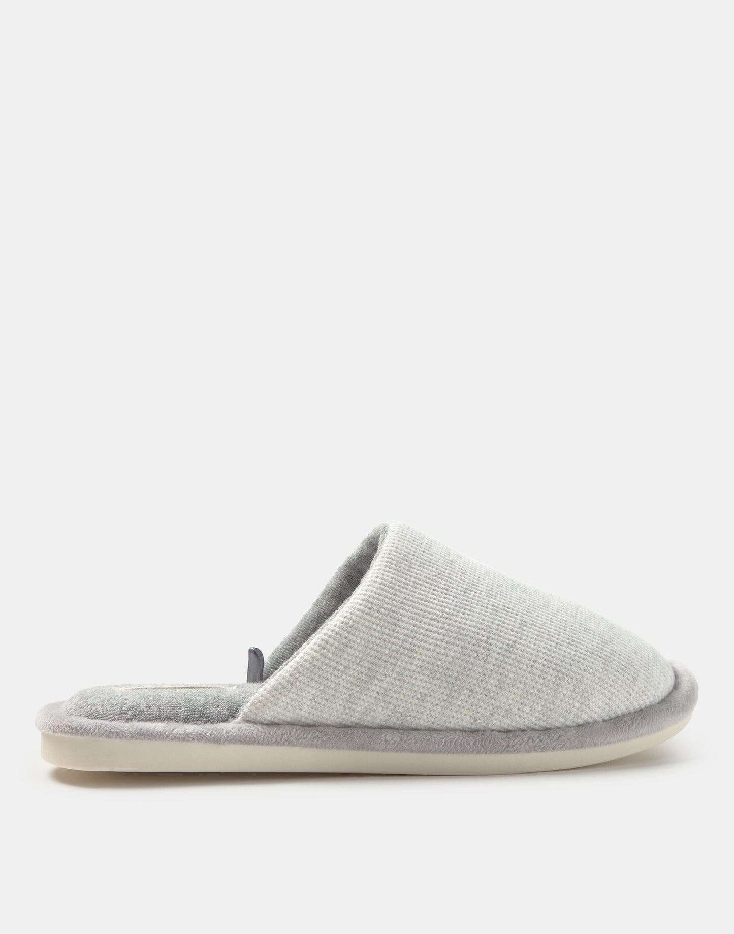 Slippers with contrasting interior