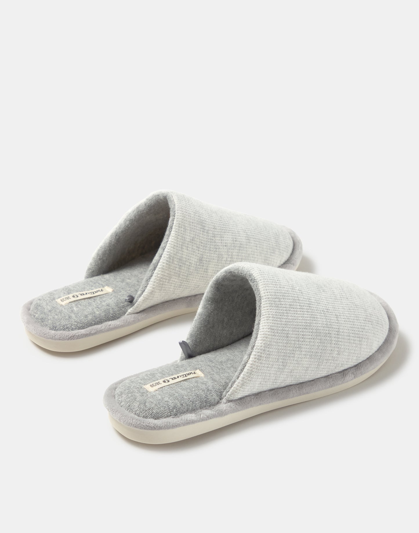 Slippers with contrasting interior