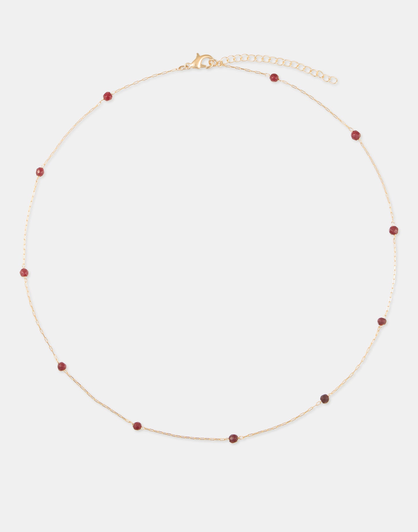 Collier doré avec pierres colorées