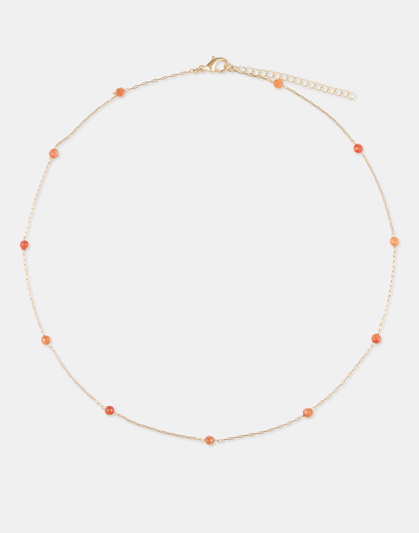 Collier doré avec pierres colorées