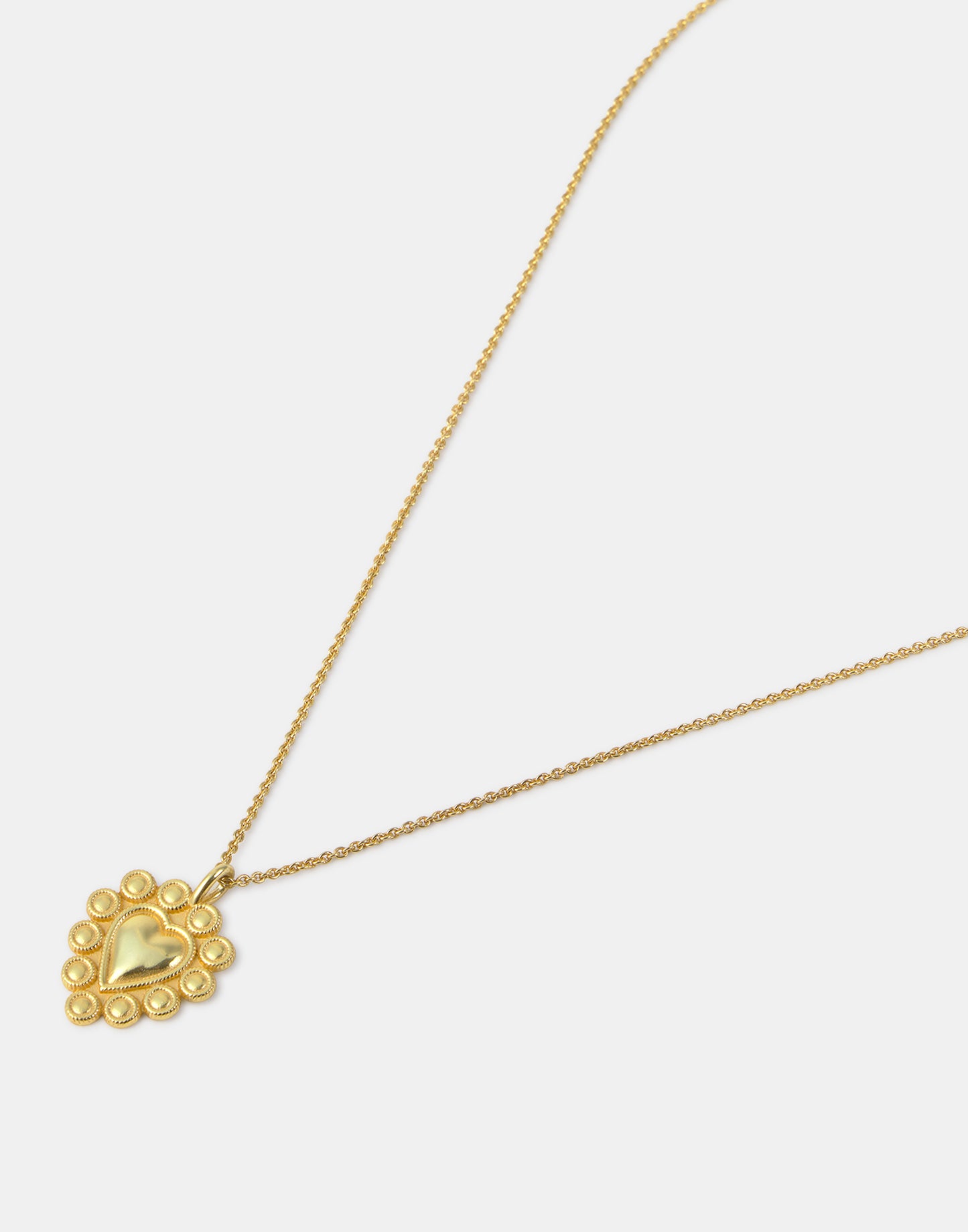 Collar corazón labrado