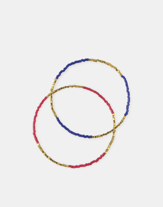 Pack 2 bracciali elastici con perline dorate