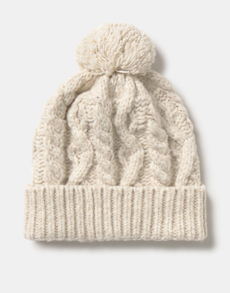 Bonnet torsadé à pompon