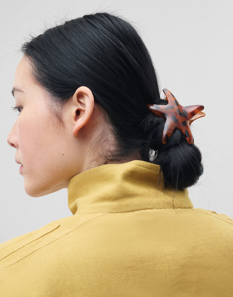 Pinza pelo estrella de mar