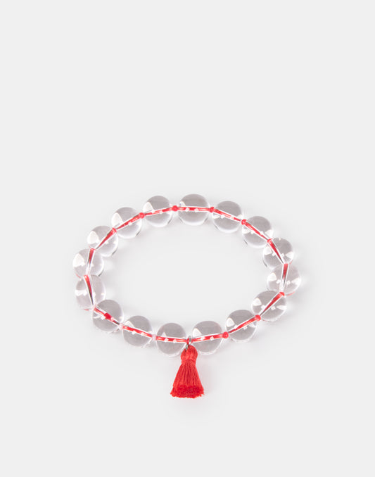 Pulsera transparente pompón