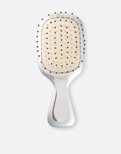 Cepillo pelo plateado