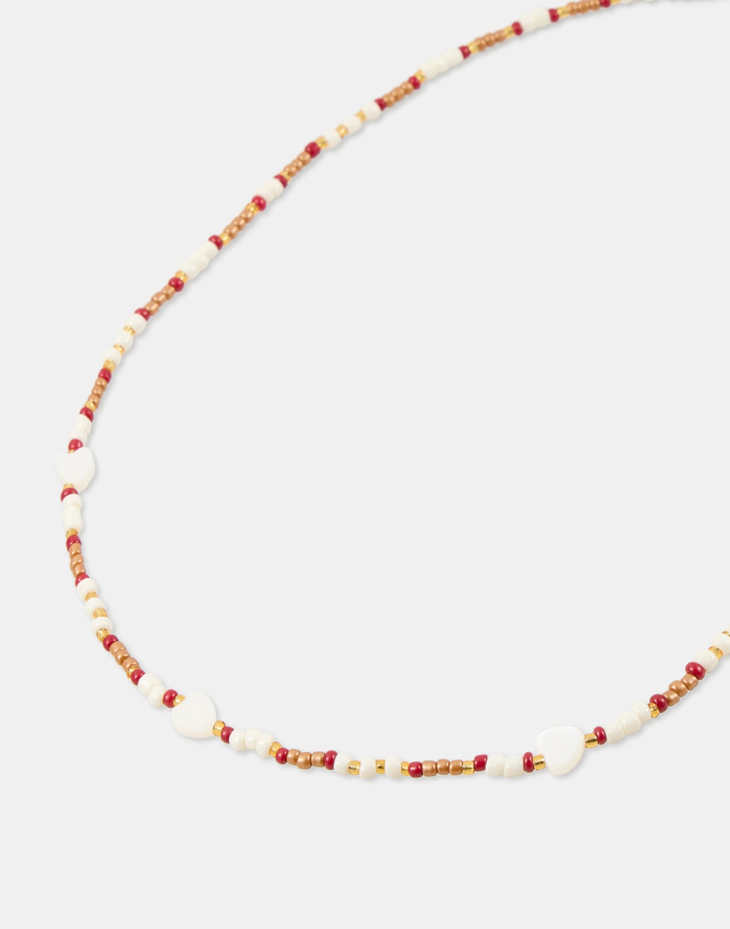 Bead necklace with shell hearts