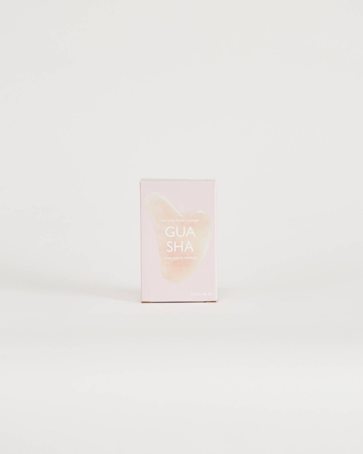 Pink quartz gua sha stone