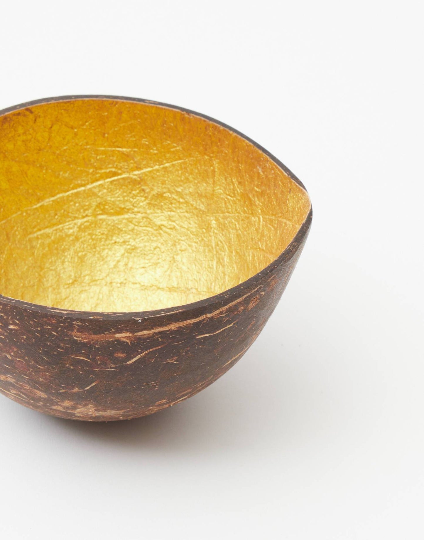 Porte-noix de coco en or